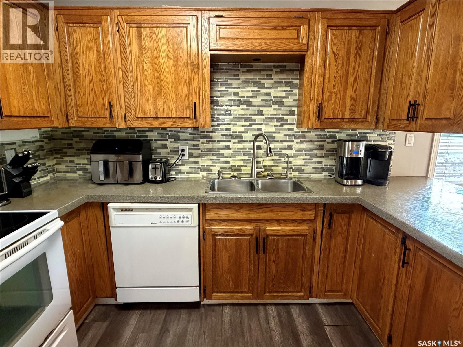 202 1St Street E, Turtleford, SK - Indoor Photo Showing Kitchen With Double Sink