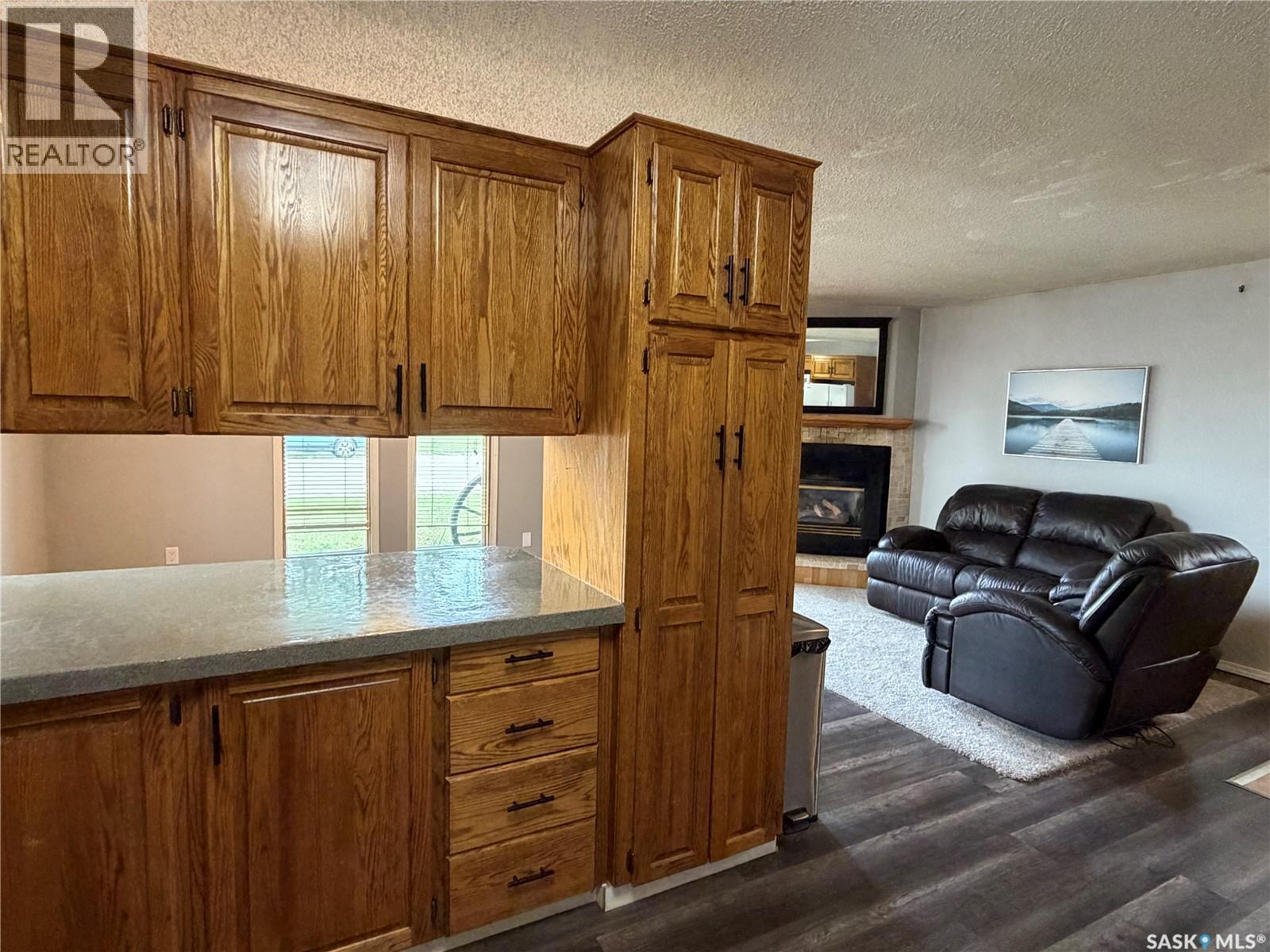 202 1St Street E, Turtleford, SK - Indoor With Fireplace