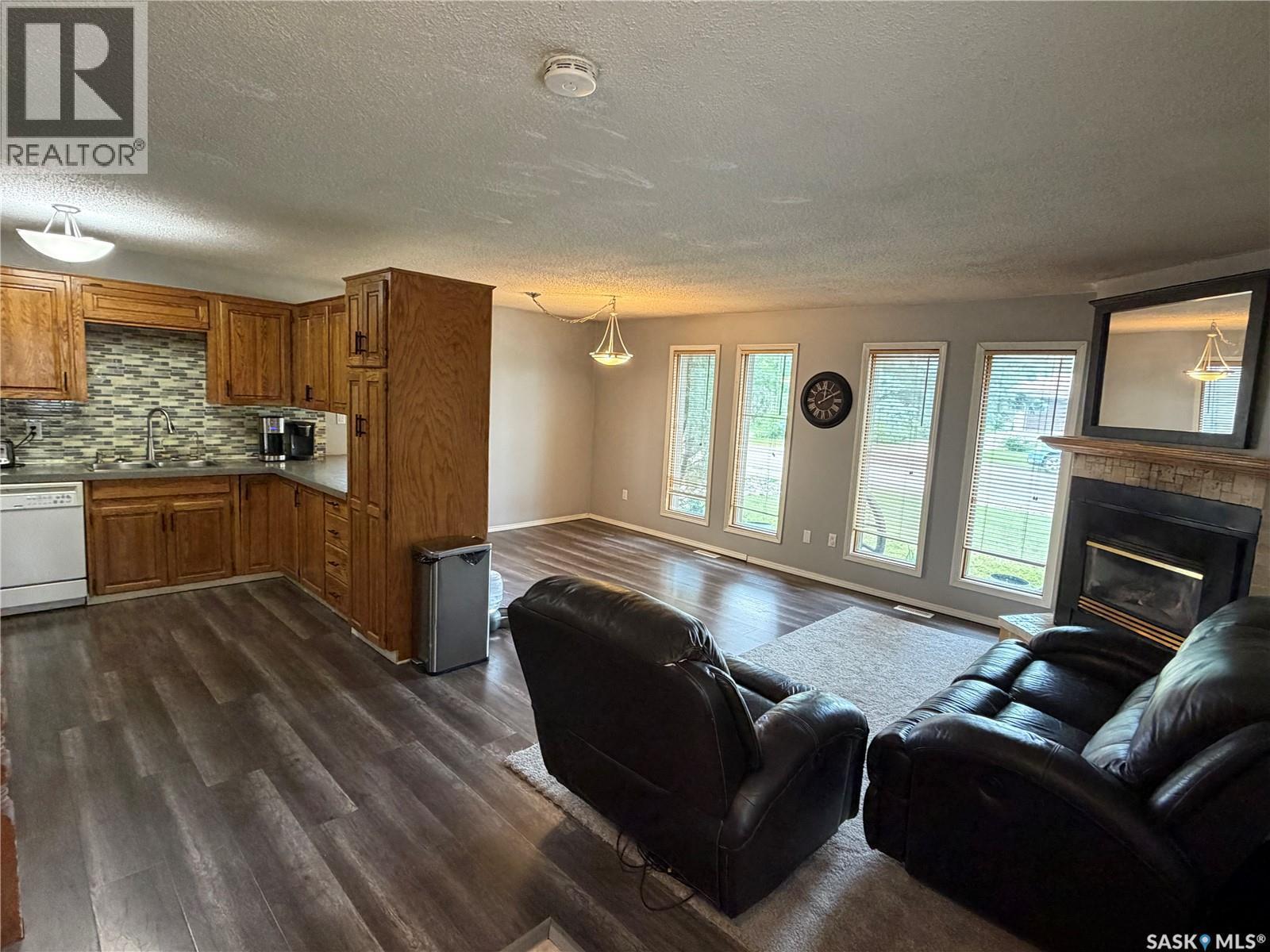 202 1St Street E, Turtleford, SK - Indoor Photo Showing Living Room With Fireplace