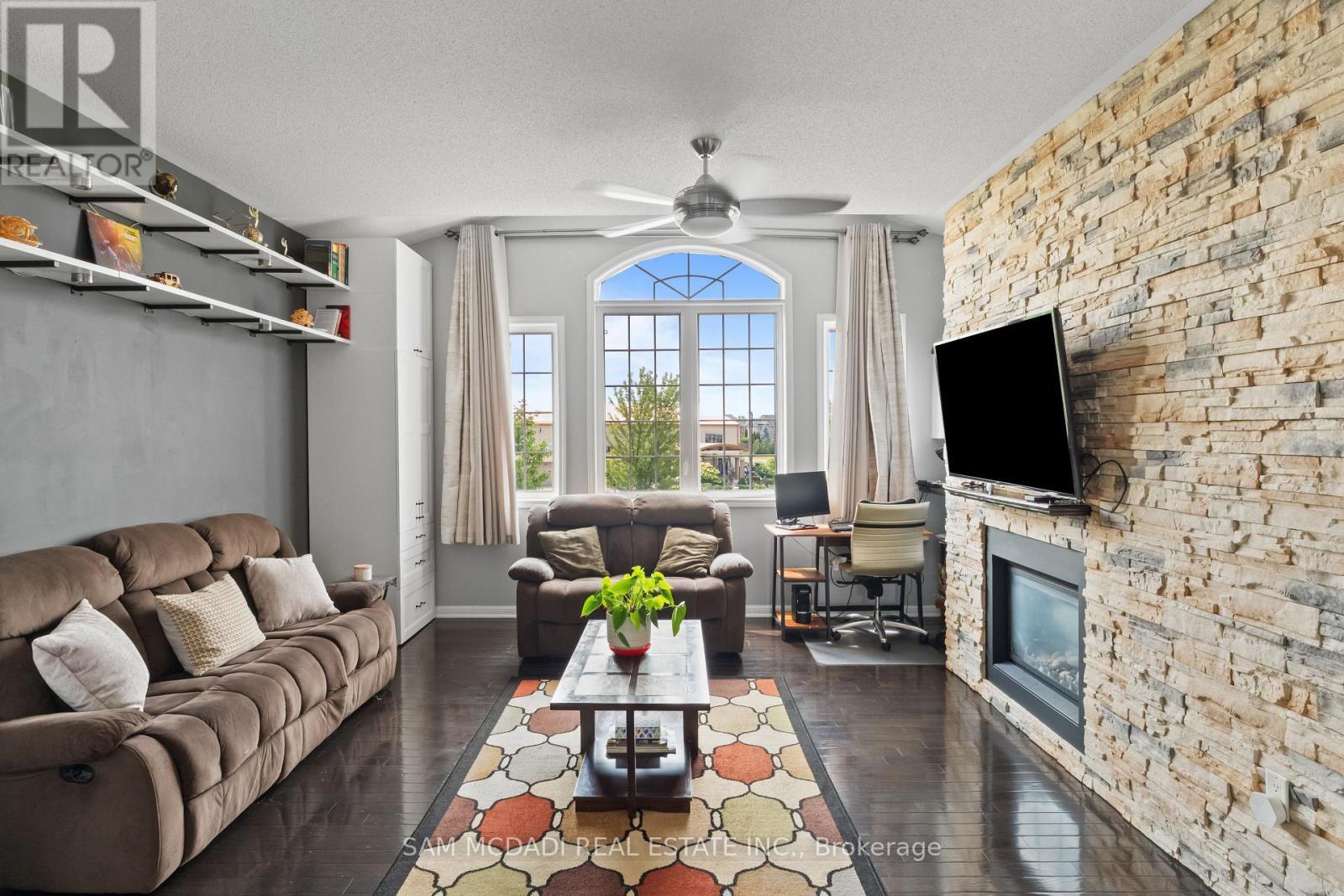 920 Clark Boulevard, Milton, ON - Indoor Photo Showing Living Room With Fireplace