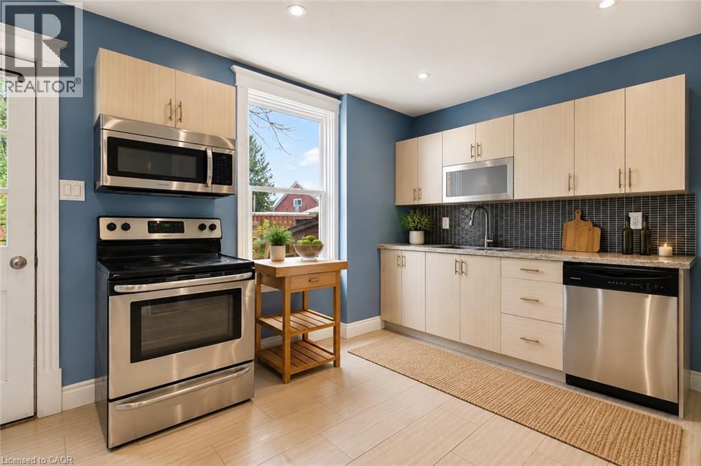 This image has been virtually staged - 520 John Street N, Hamilton, ON - Indoor Photo Showing Kitchen