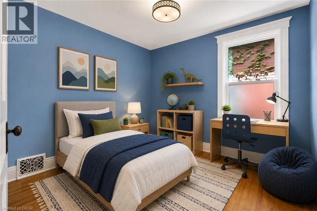 This image has been virtually staged - 520 John Street N, Hamilton, ON - Indoor Photo Showing Bedroom