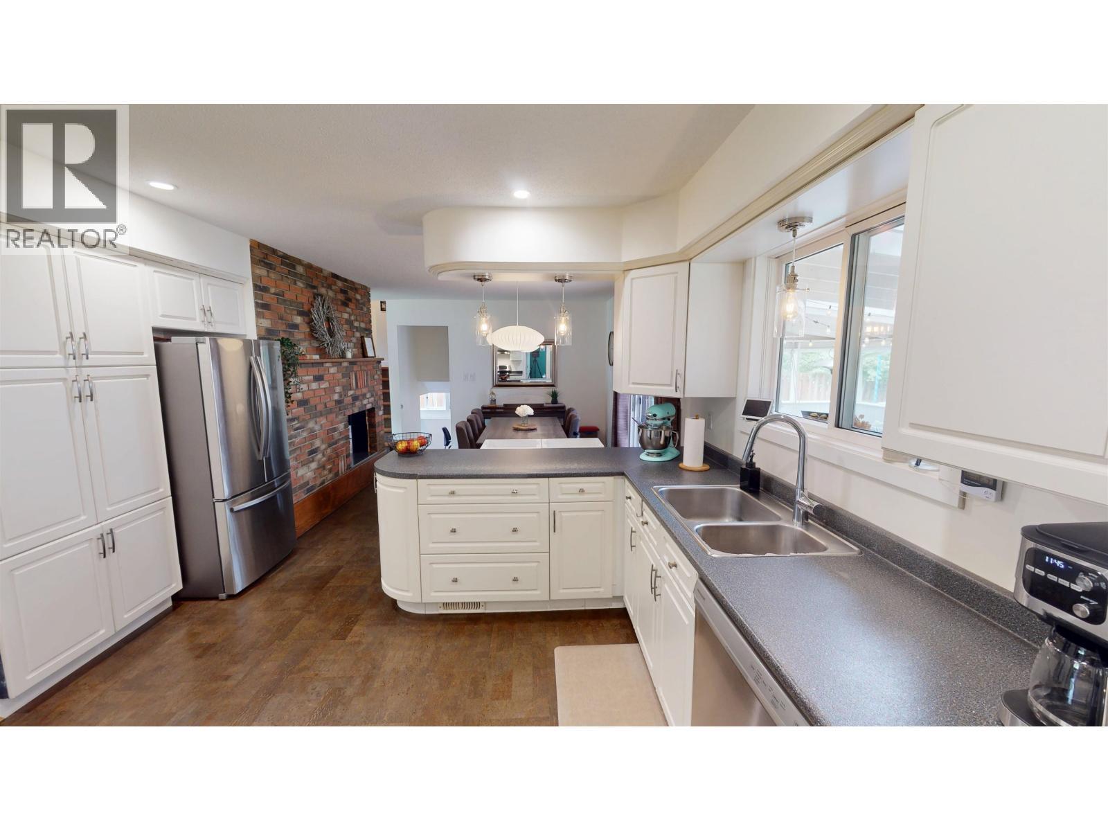 115 S Brears Road, Quesnel, BC - Indoor Photo Showing Kitchen With Double Sink