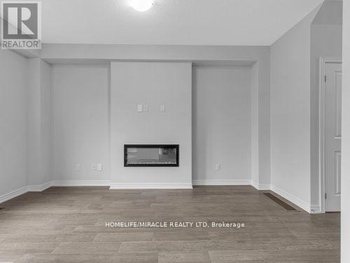 32 Vickers Road, Hamilton, ON - Indoor With Fireplace