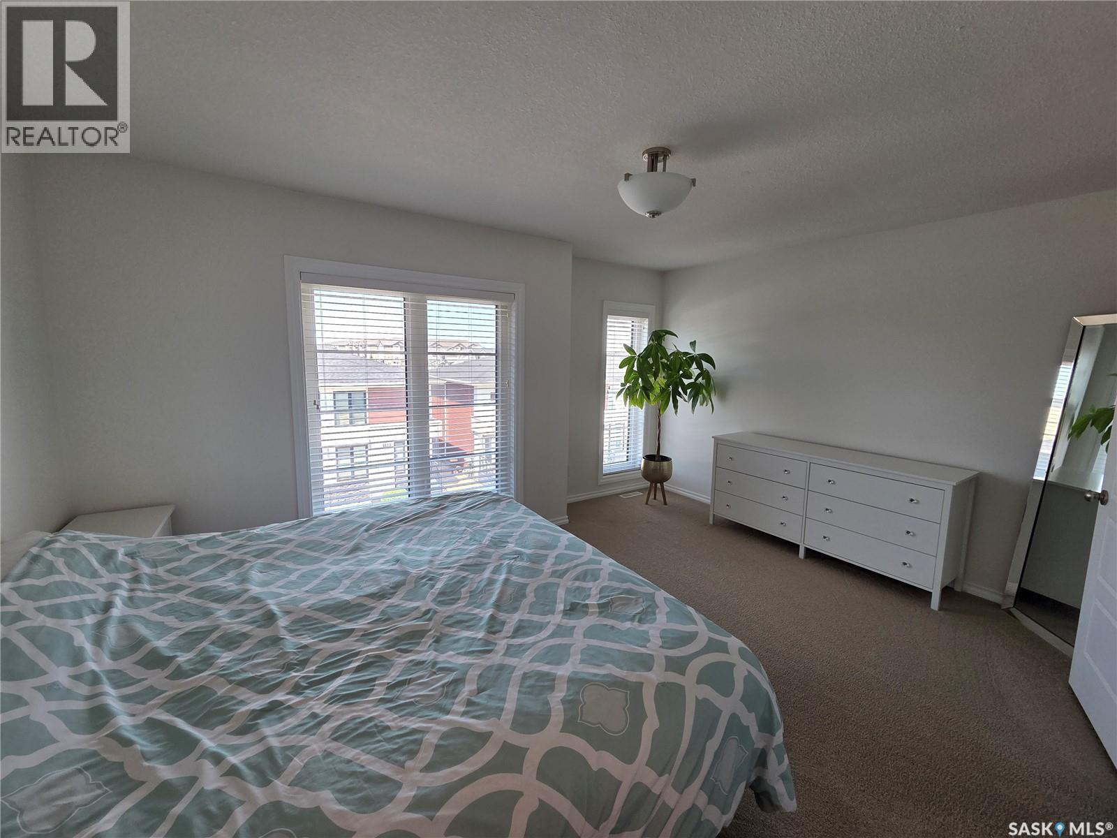 204 3229 Elgaard Drive, Regina, SK - Indoor Photo Showing Bedroom
