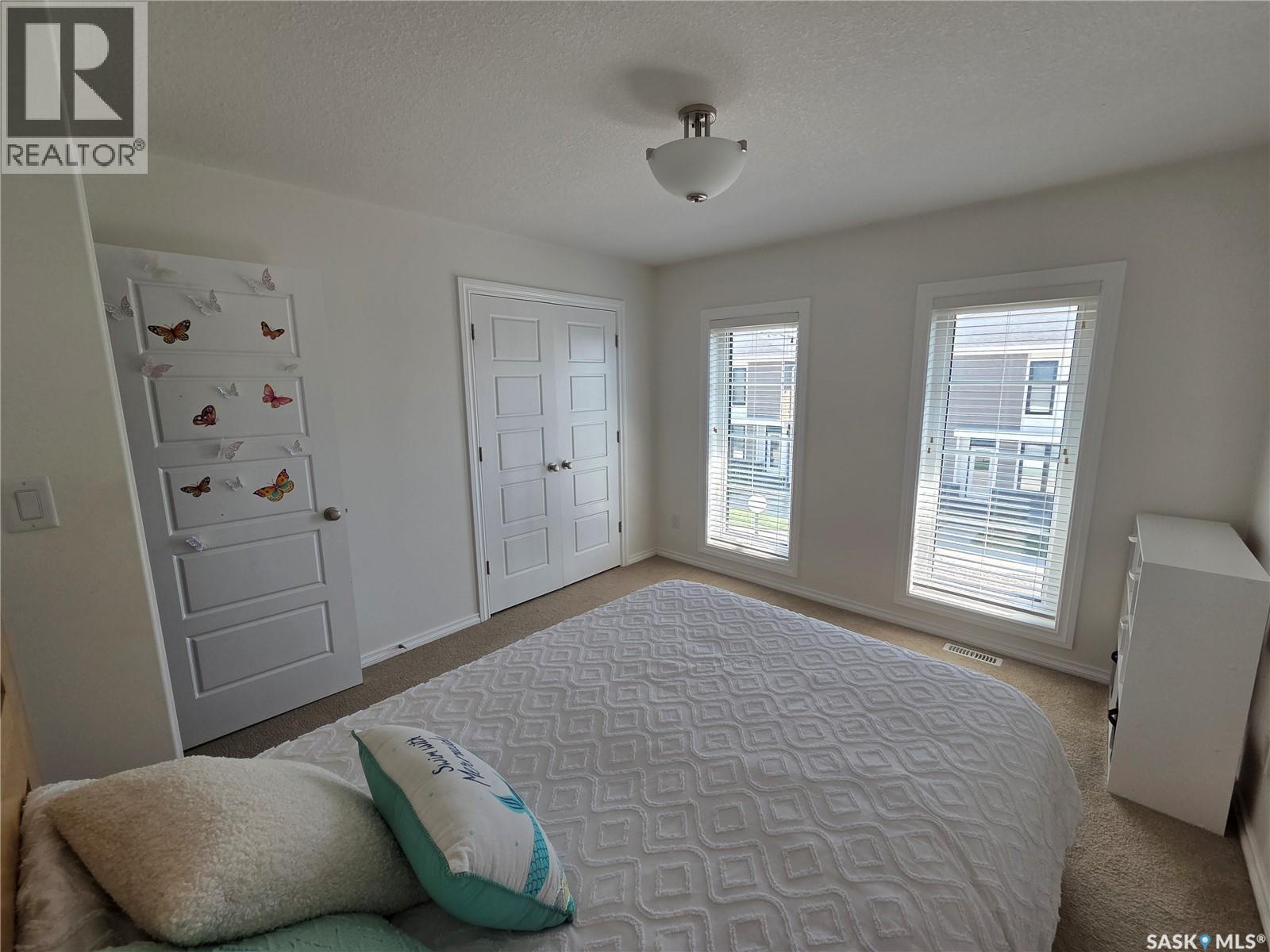 204 3229 Elgaard Drive, Regina, SK - Indoor Photo Showing Bedroom