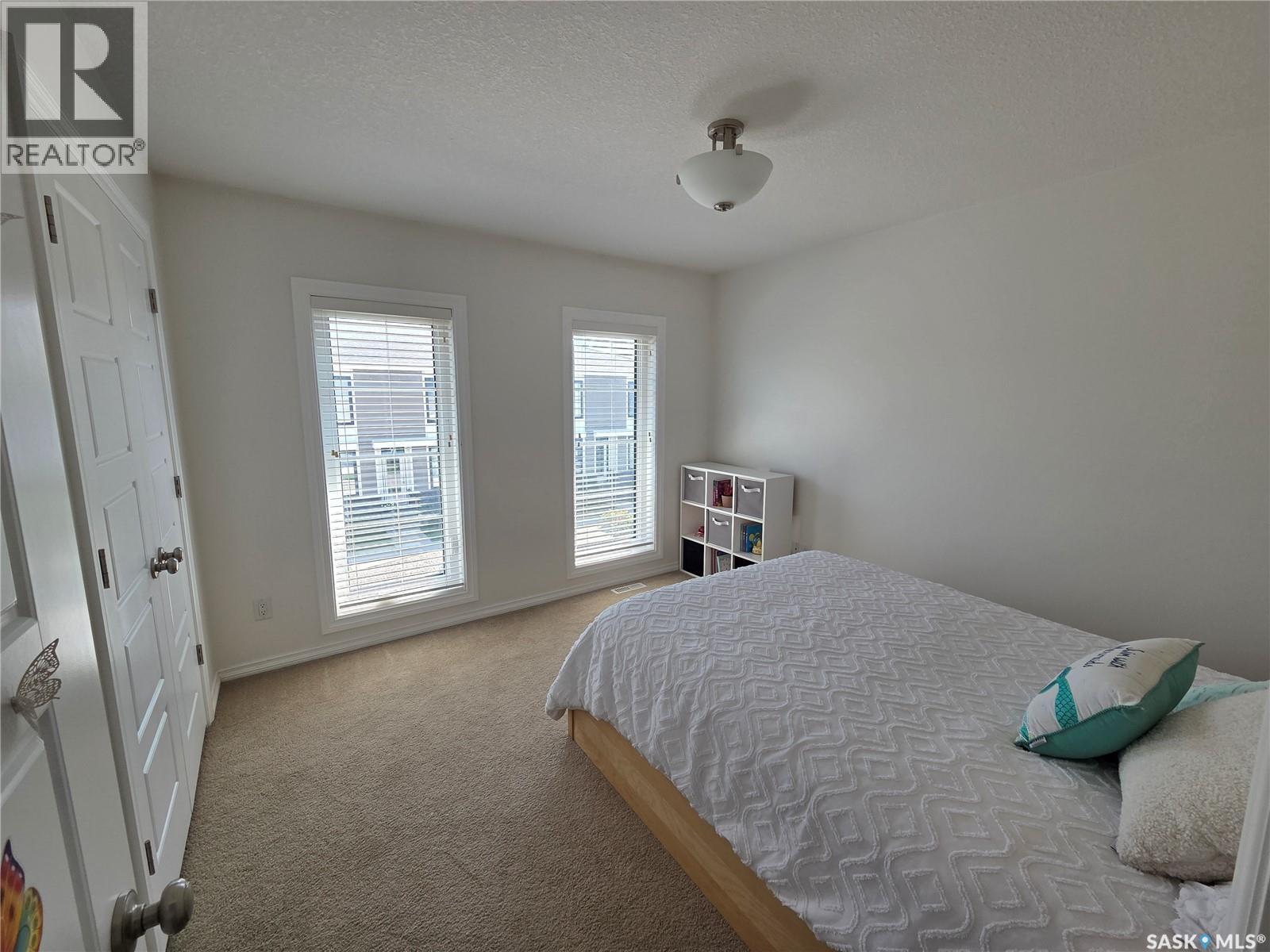204 3229 Elgaard Drive, Regina, SK - Indoor Photo Showing Bedroom