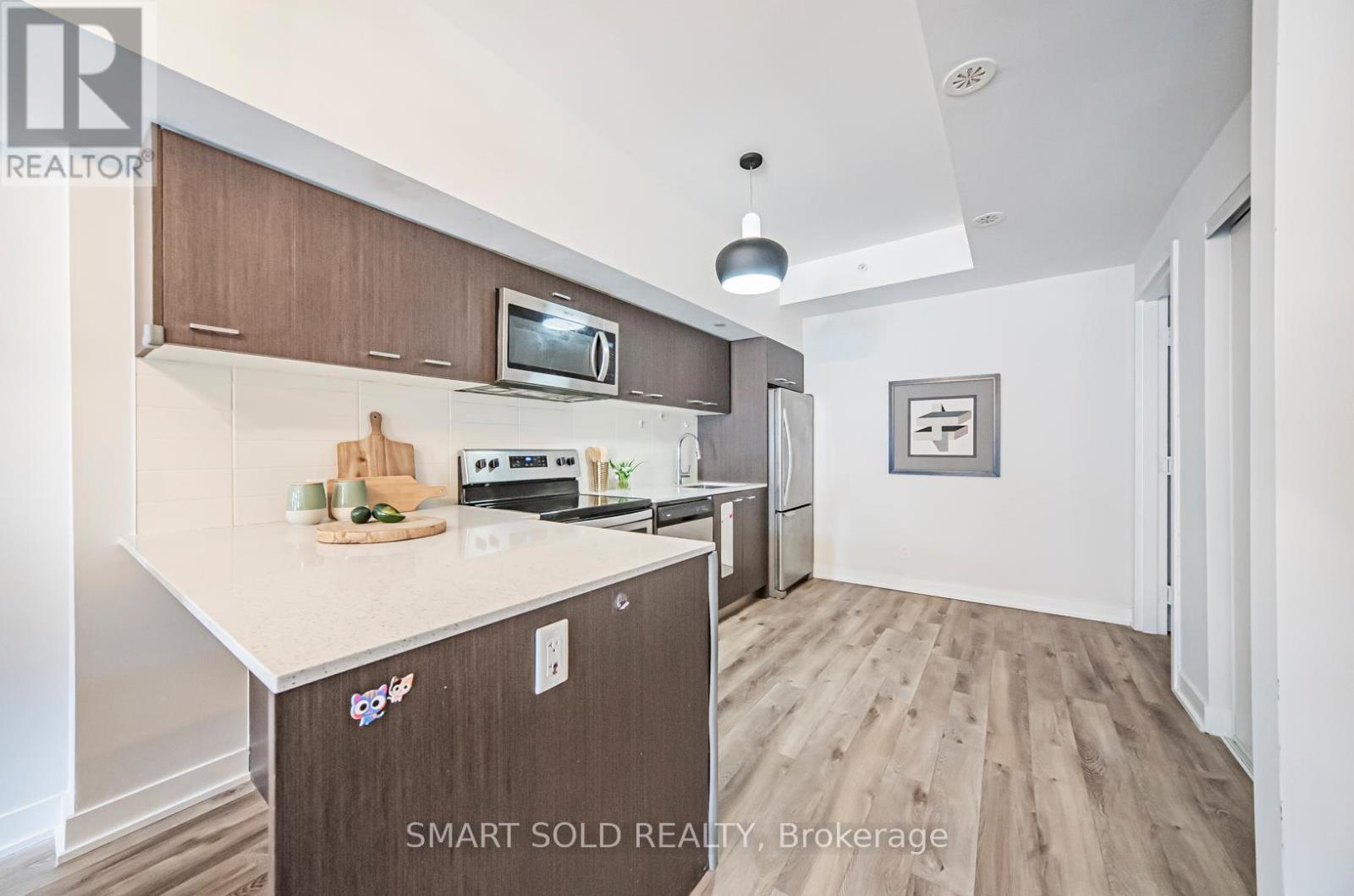 132 - 20 Echo Point, Toronto, ON - Indoor Photo Showing Kitchen