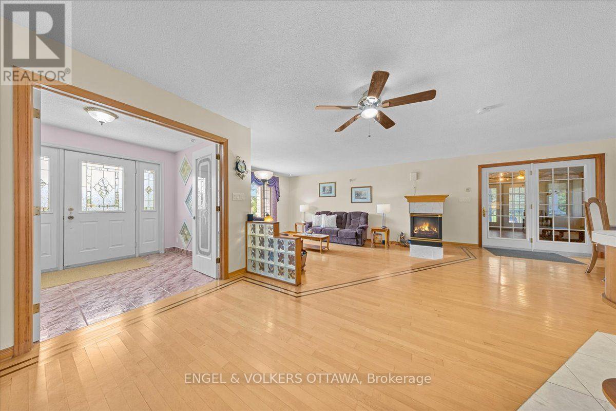 3805 Big Rideau Lake Road, Rideau Lakes, ON - Indoor With Fireplace