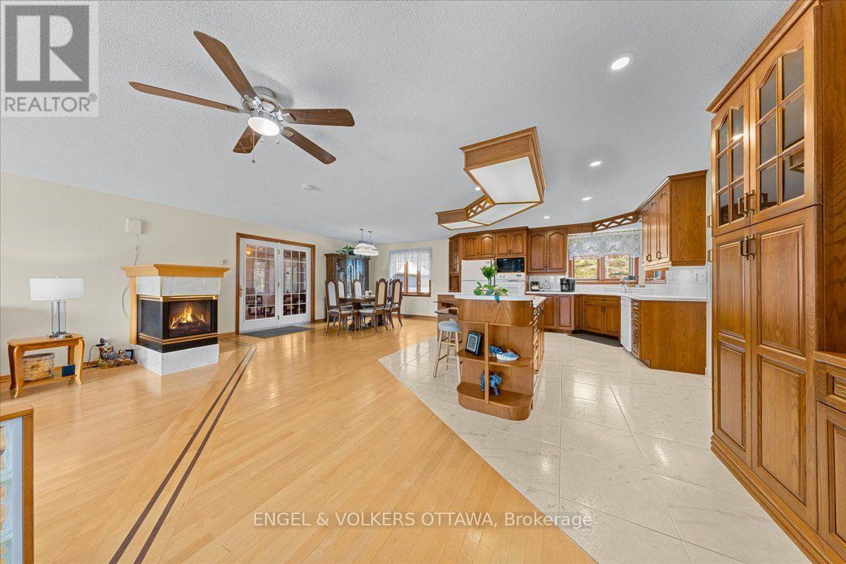 3805 Big Rideau Lake Road, Rideau Lakes, ON - Indoor With Fireplace