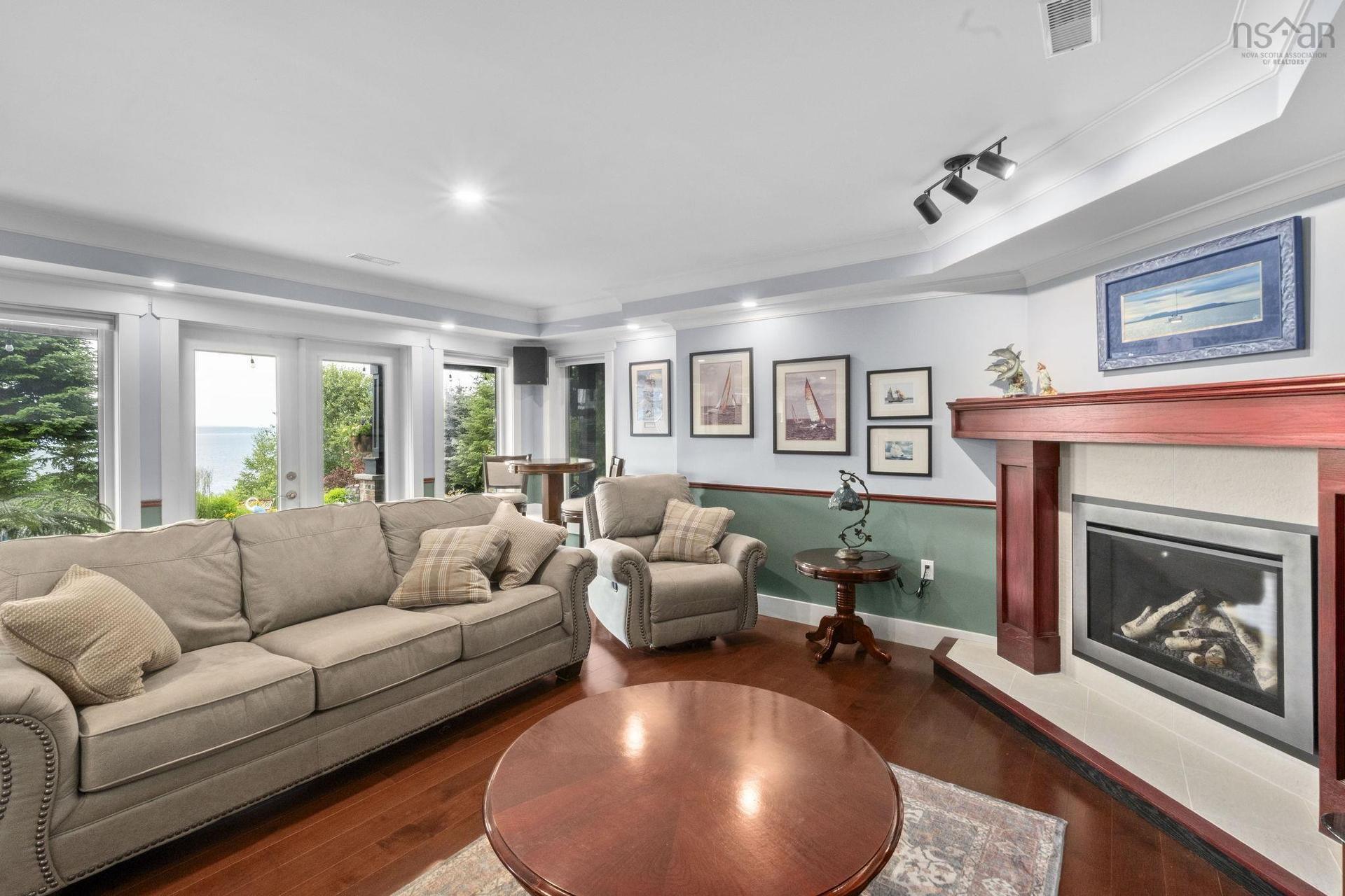 116 Whitecap Ridge, Black Point, NS - Indoor Photo Showing Living Room With Fireplace