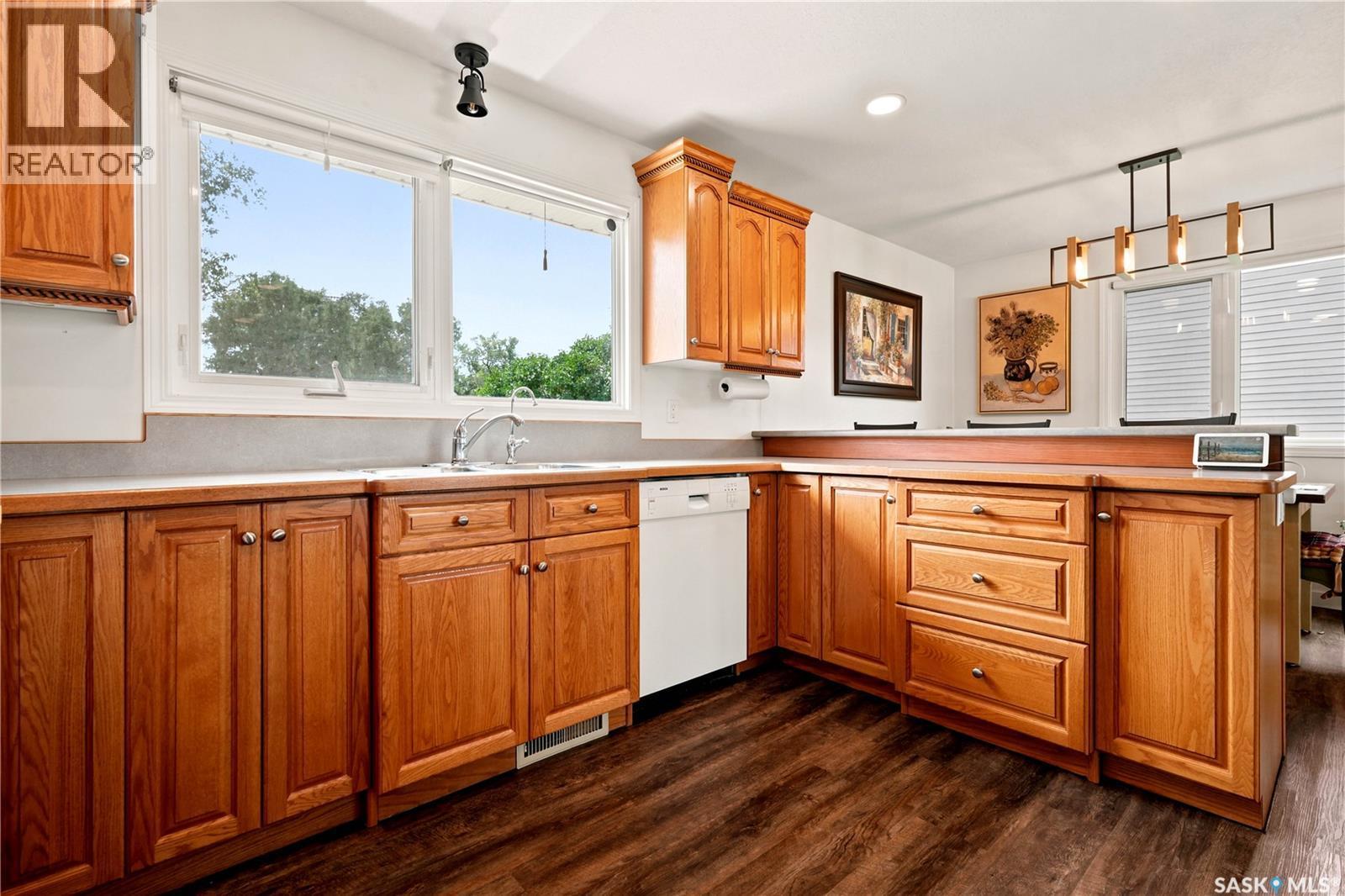 7343 8Th Avenue, Regina, SK - Indoor Photo Showing Kitchen With Double Sink