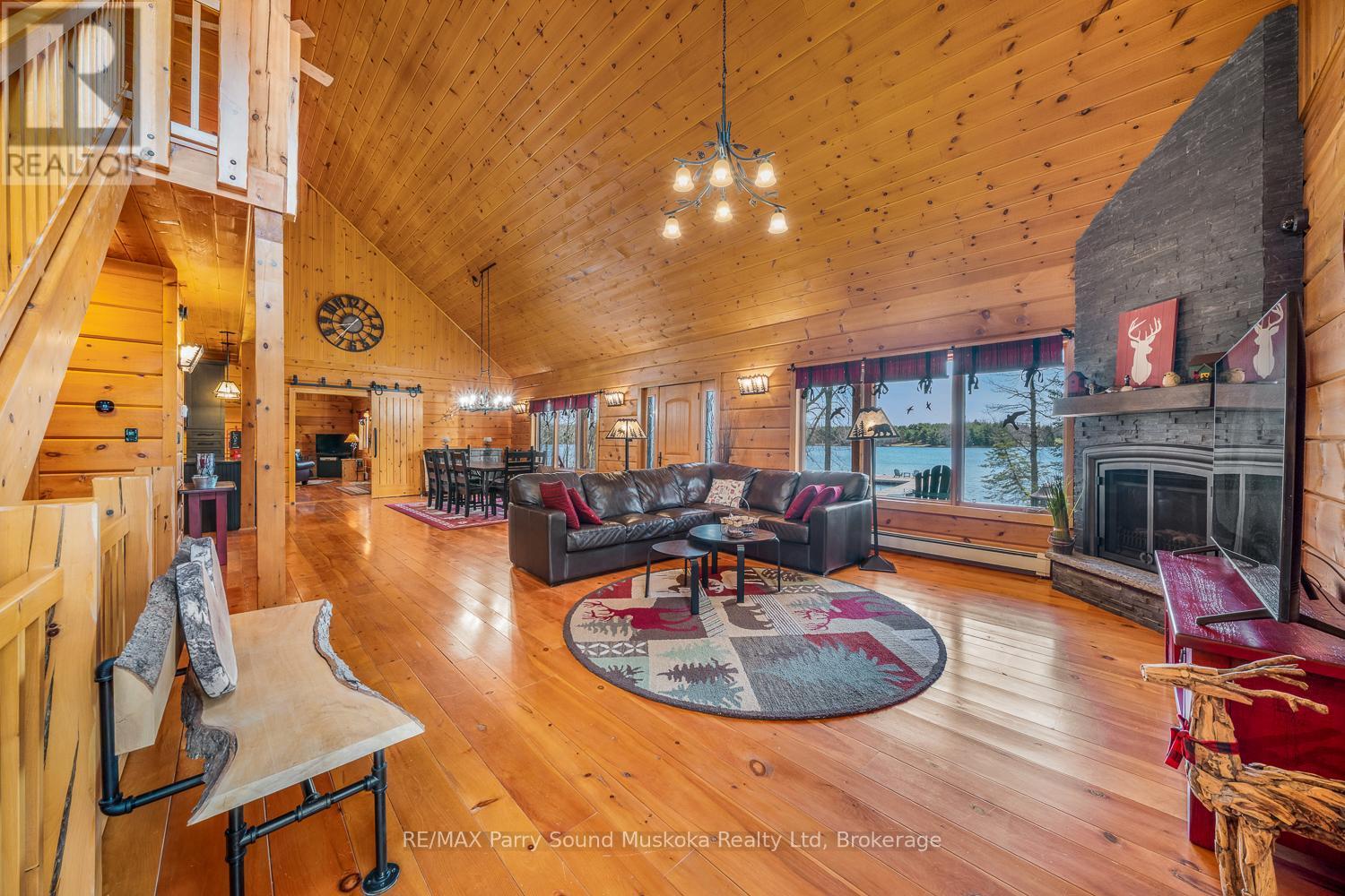48 Wendy'S Lane, Mckellar, ON - Indoor Photo Showing Living Room With Fireplace