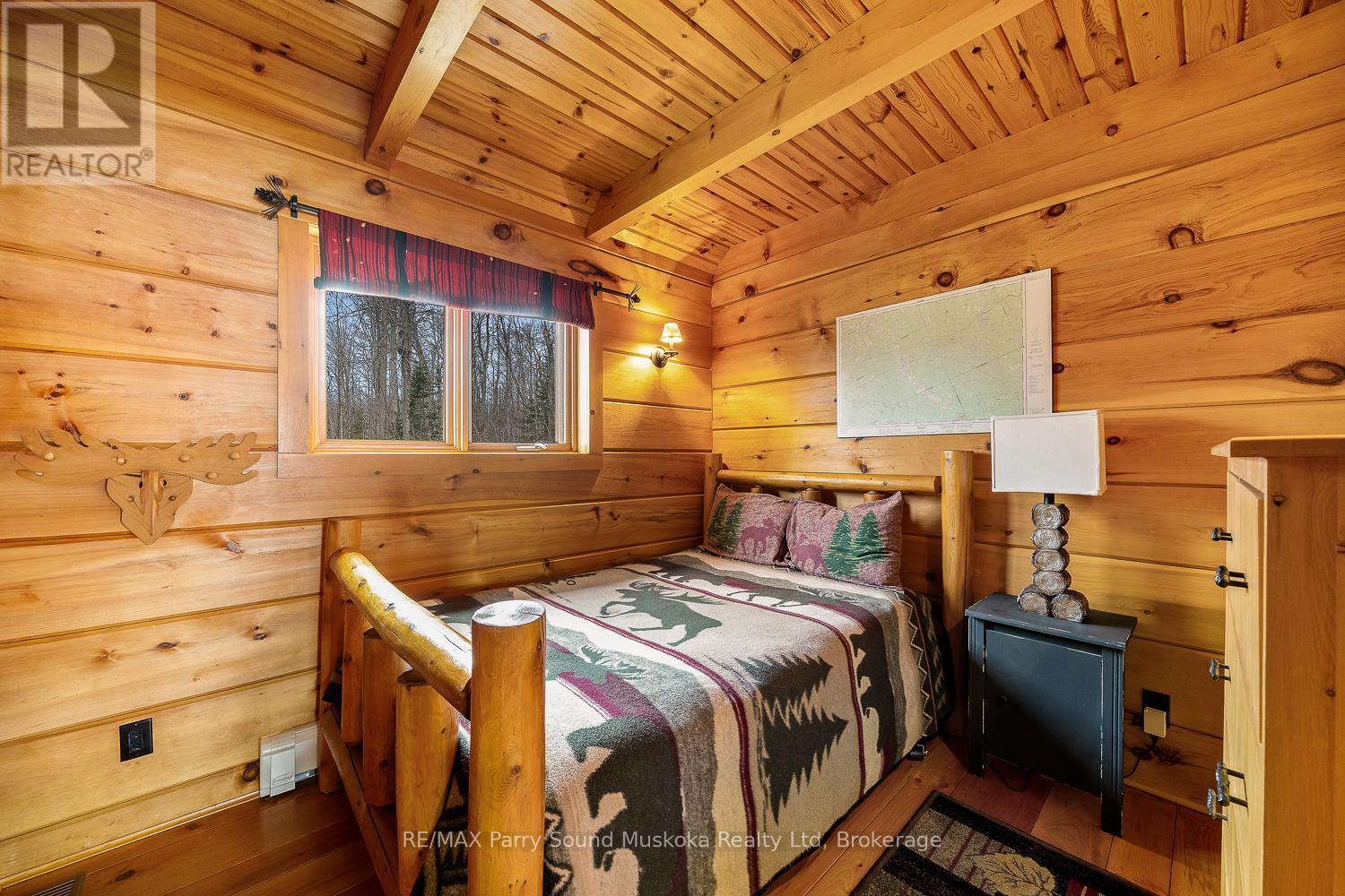 48 Wendy'S Lane, Mckellar, ON - Indoor Photo Showing Bedroom