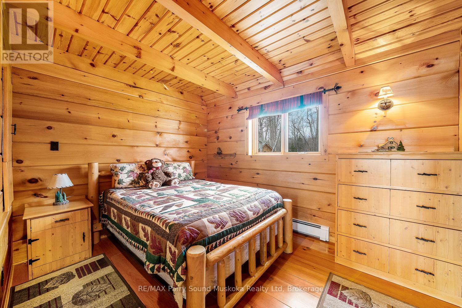 48 Wendy'S Lane, Mckellar, ON - Indoor Photo Showing Bedroom