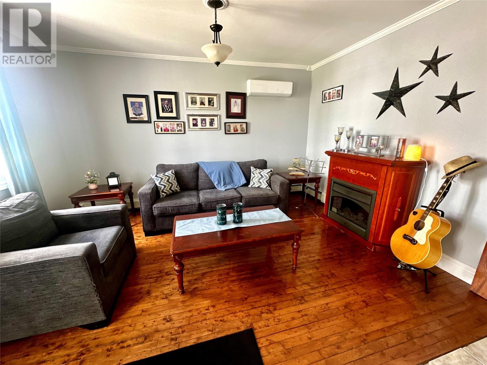 3 Sunset Drive, Badger, NL - Indoor Photo Showing Living Room With Fireplace