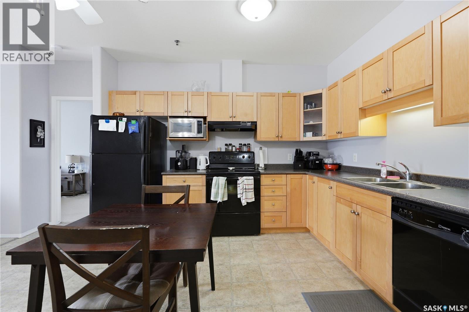 303 302 Nelson Road, Saskatoon, SK - Indoor Photo Showing Kitchen With Double Sink