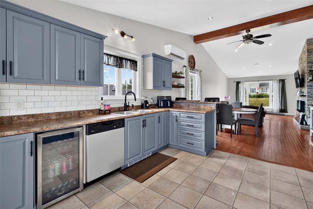 21 Fitzgerald Place, Bay Roberts, NL - Indoor Photo Showing Kitchen With Fireplace With Double Sink