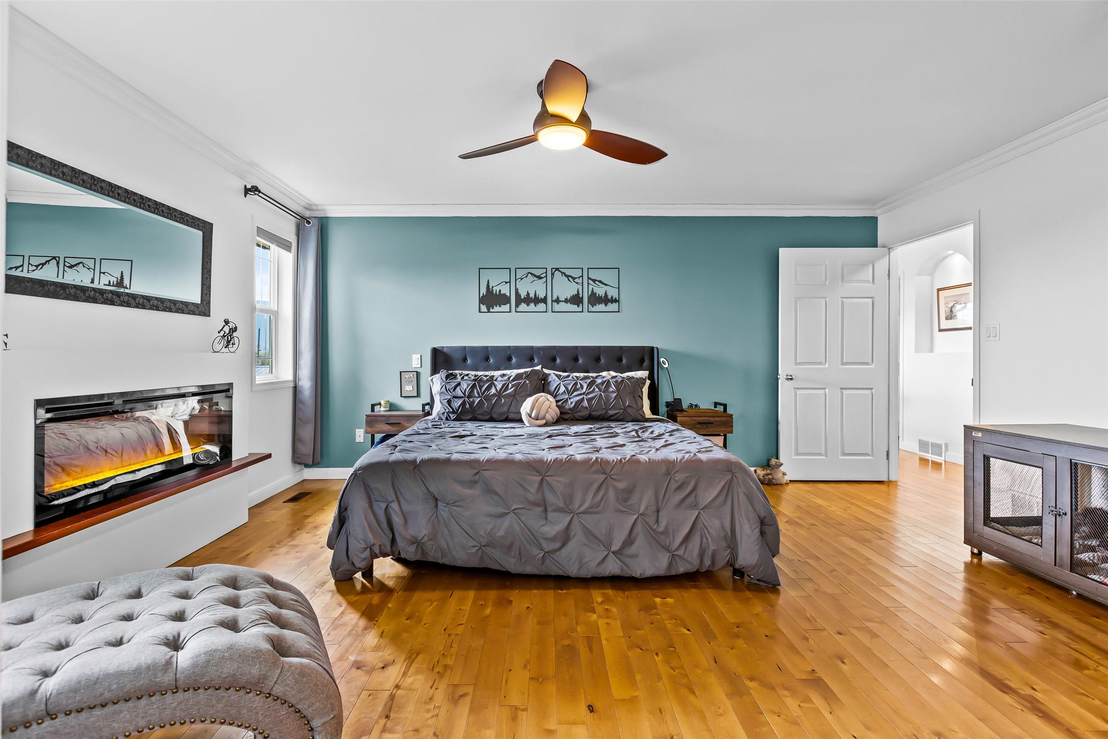 1901 Alder Street, Creston, BC - Indoor Photo Showing Bedroom With Fireplace