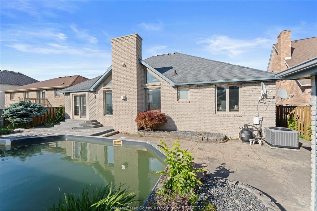 2689 Buttery Street, Windsor, ON - Outdoor With In Ground Pool
