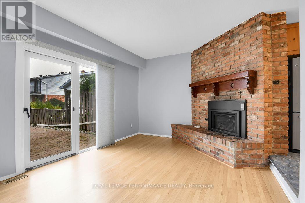 67 Ramsgate Private, Ottawa, ON - Indoor Photo Showing Living Room With Fireplace