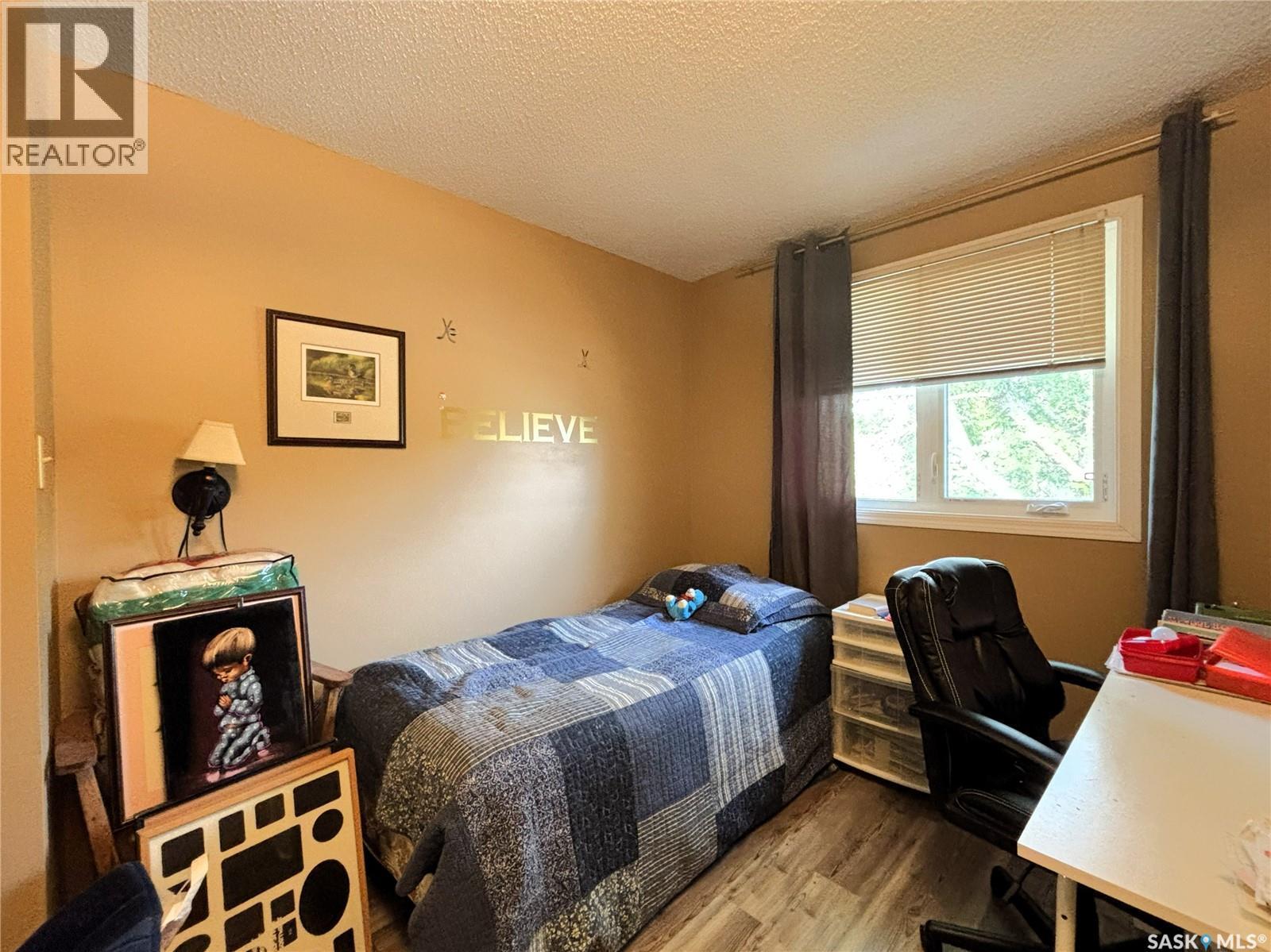 127 1128 Mckercher Drive, Saskatoon, SK - Indoor Photo Showing Bedroom