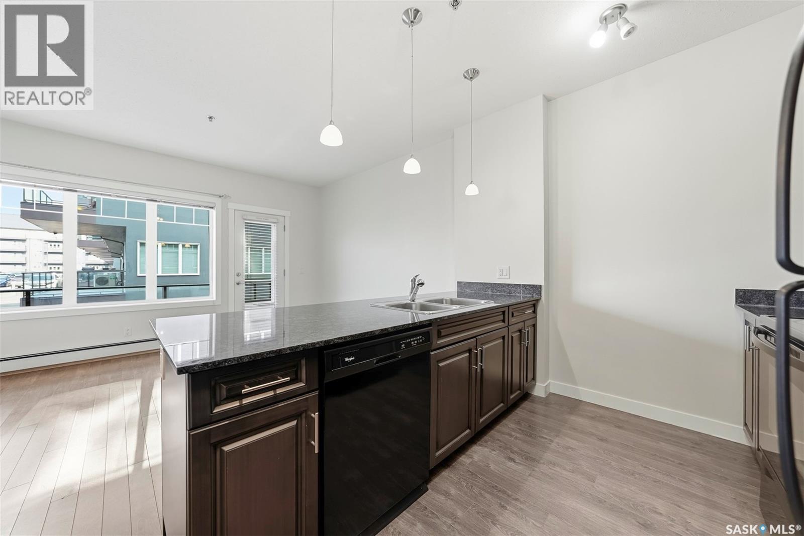 104 714 Hart Road, Saskatoon, SK - Indoor Photo Showing Kitchen With Double Sink