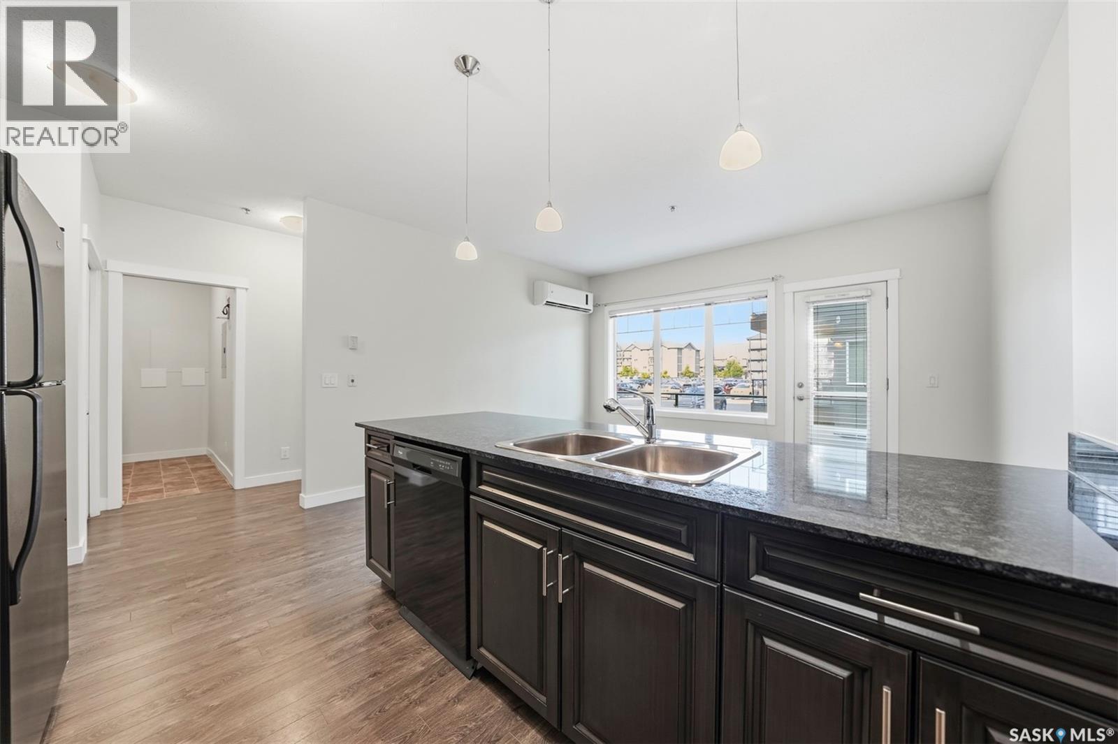 104 714 Hart Road, Saskatoon, SK - Indoor Photo Showing Kitchen With Double Sink
