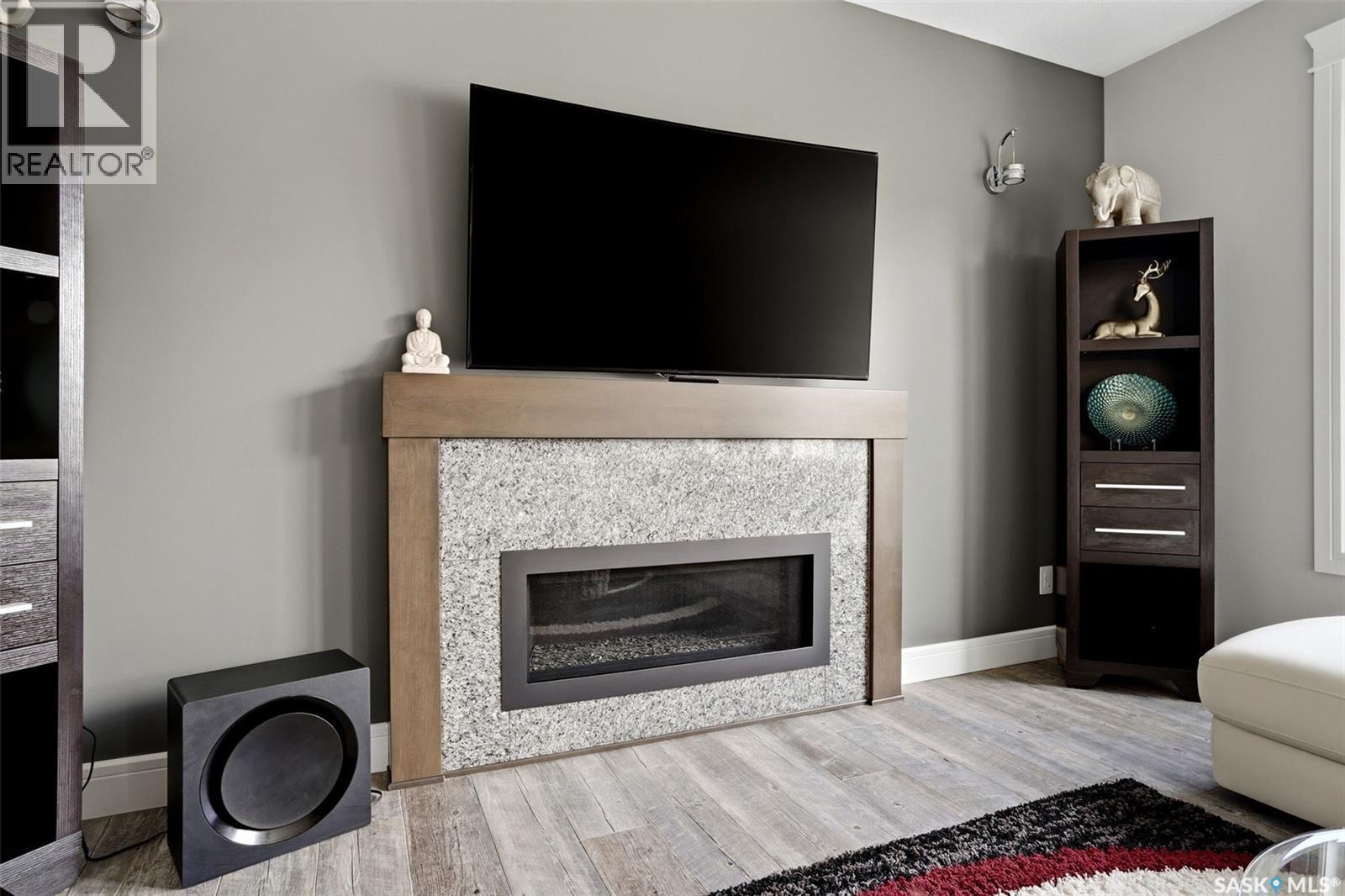 4868 Wright Road, Regina, SK - Indoor Photo Showing Living Room With Fireplace