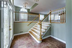 Enter the foyer through front door or garage - 