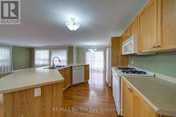 Patio doors access a 450 sq ft deck - 