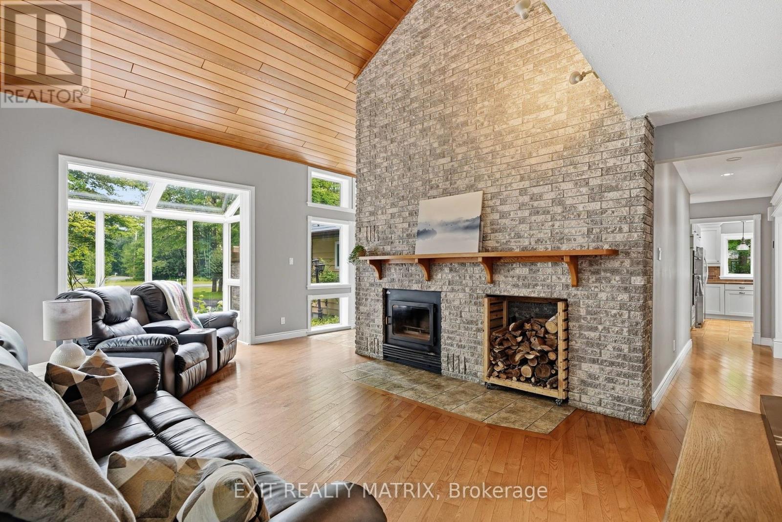 1634 Lucien Street, Champlain, ON - Indoor Photo Showing Living Room With Fireplace