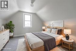 Attic space with sloped ceilings and a single window - 
