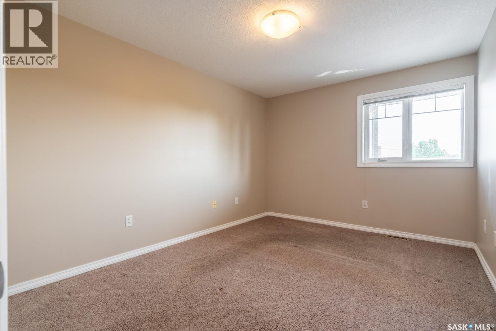 108 6345 Rochdale Boulevard, Regina, SK - Indoor Photo Showing Other Room