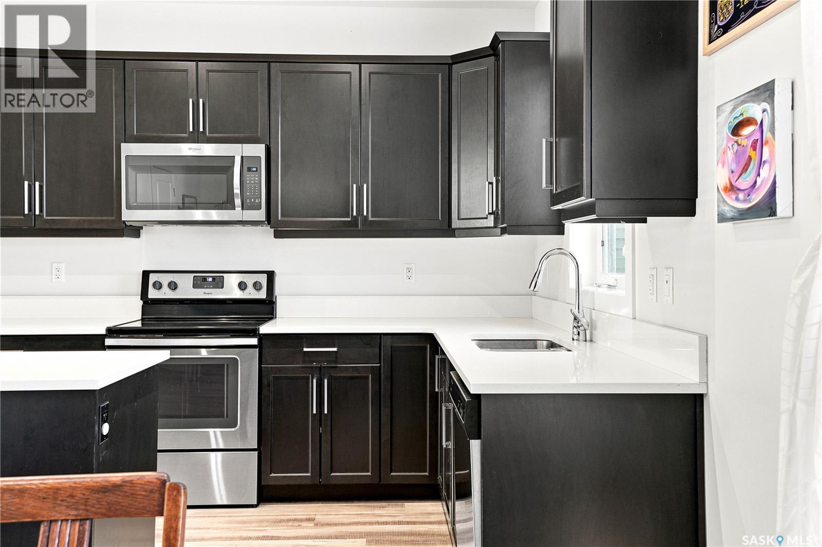 659 Secord Bend, Saskatoon, SK - Indoor Photo Showing Kitchen With Stainless Steel Kitchen With Upgraded Kitchen