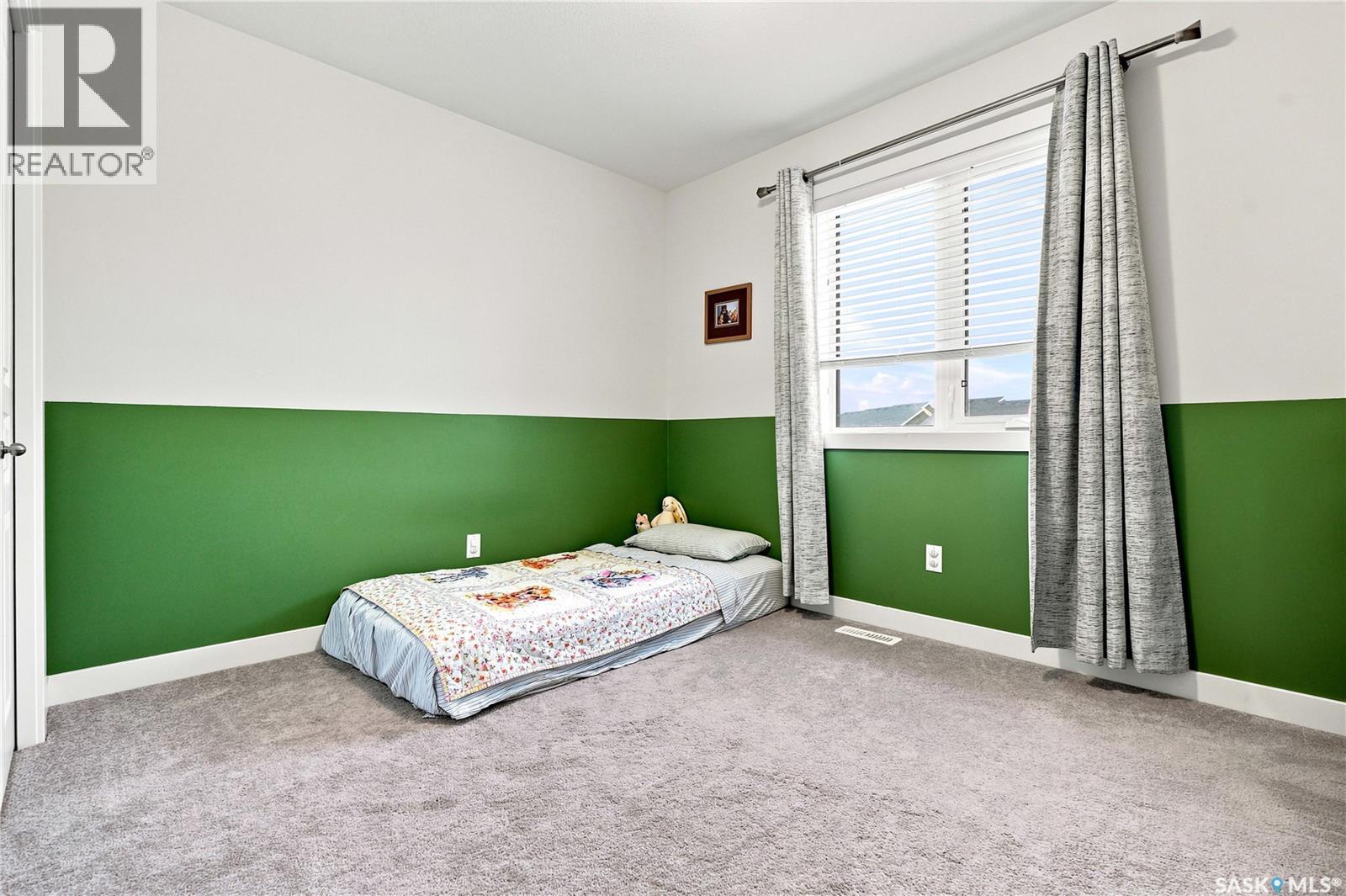659 Secord Bend, Saskatoon, SK - Indoor Photo Showing Bedroom