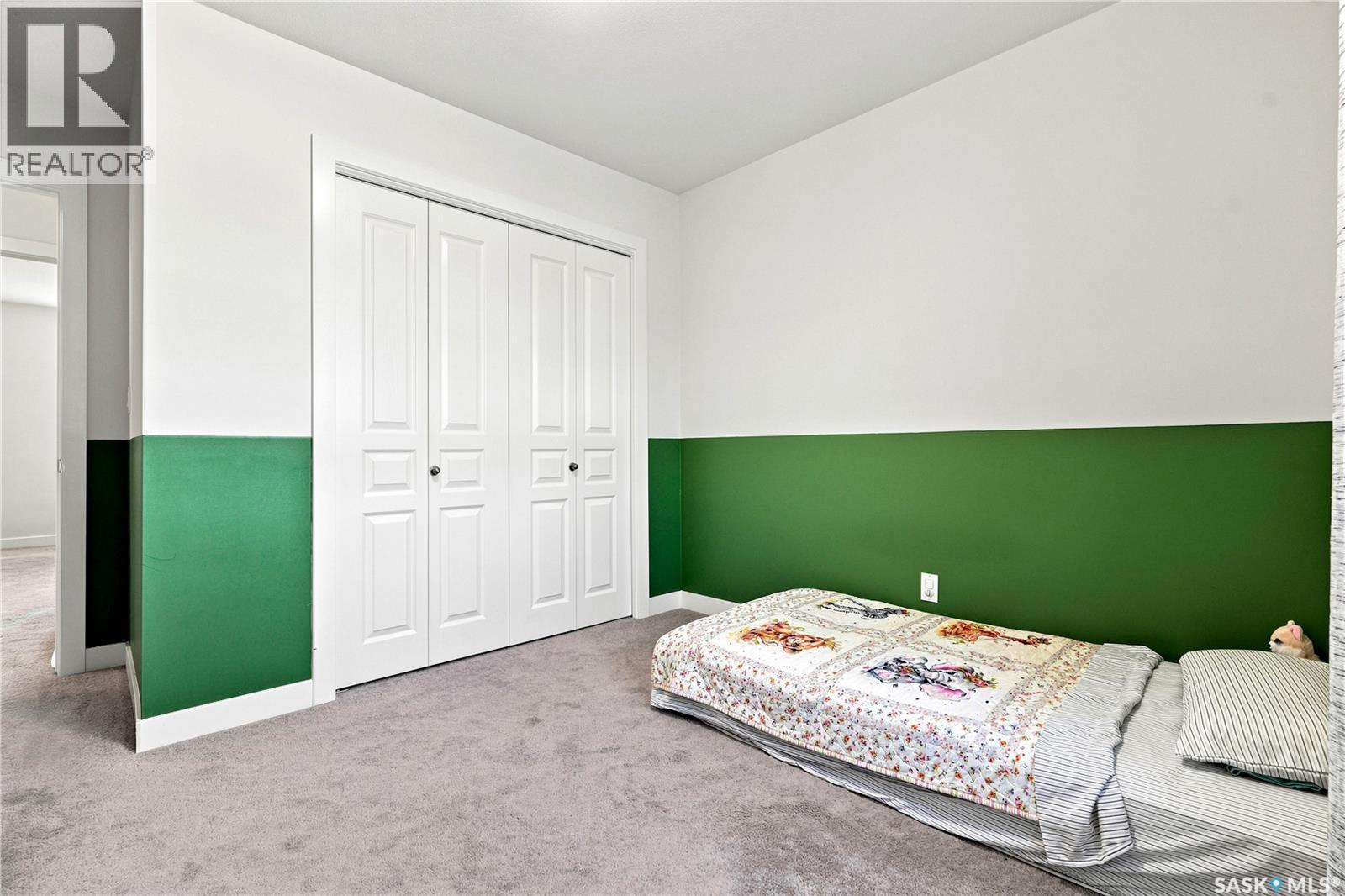 659 Secord Bend, Saskatoon, SK - Indoor Photo Showing Bedroom