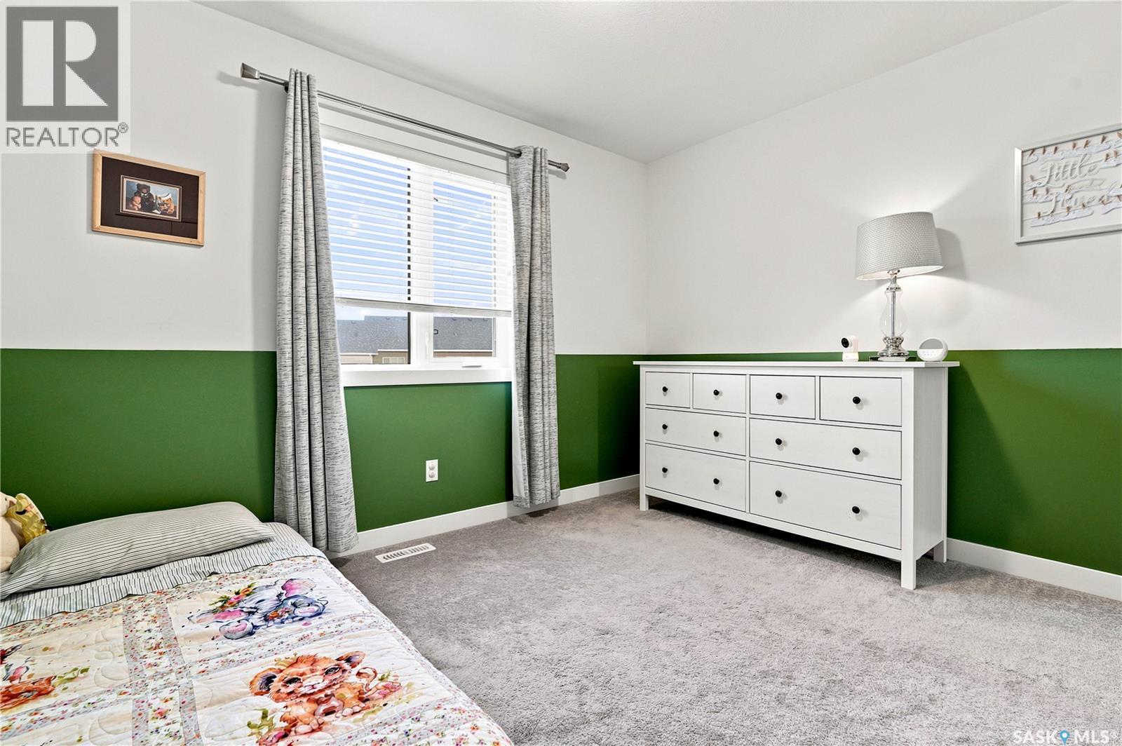 659 Secord Bend, Saskatoon, SK - Indoor Photo Showing Bedroom