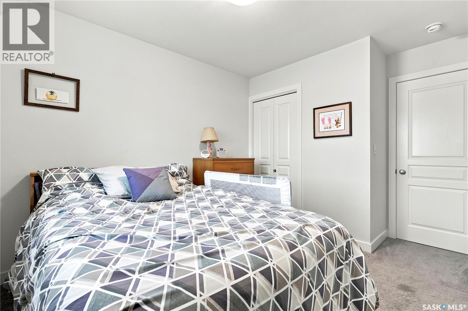 659 Secord Bend, Saskatoon, SK - Indoor Photo Showing Bedroom