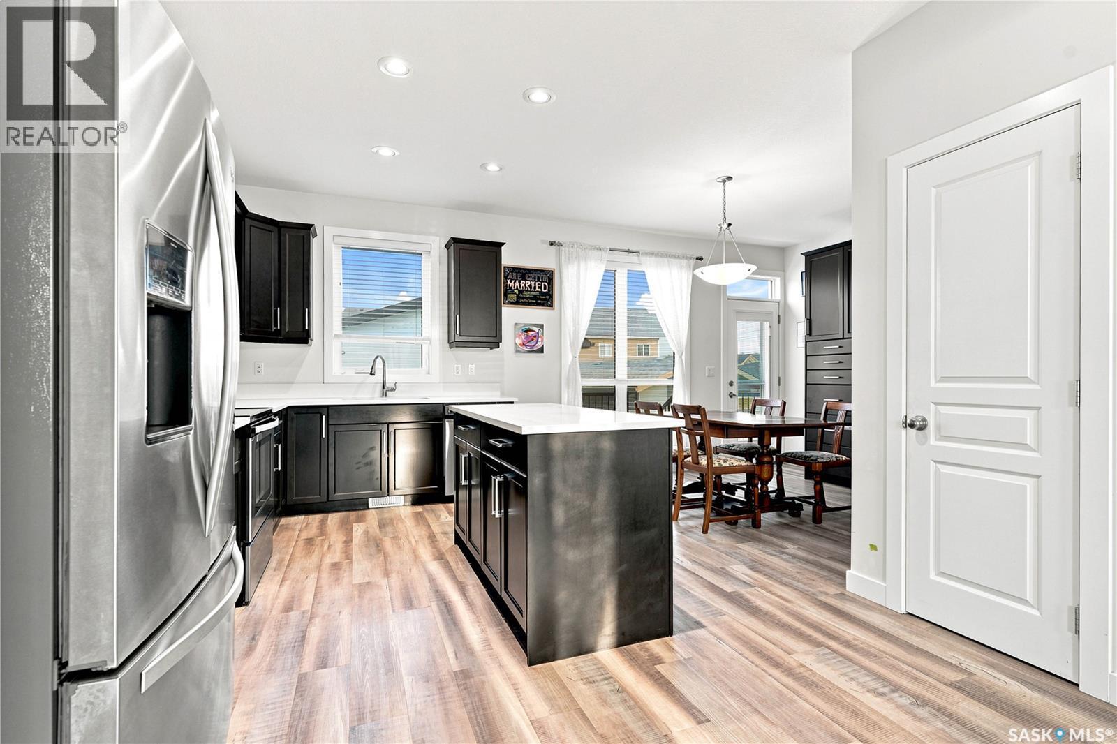 659 Secord Bend, Saskatoon, SK - Indoor Photo Showing Kitchen With Stainless Steel Kitchen With Upgraded Kitchen