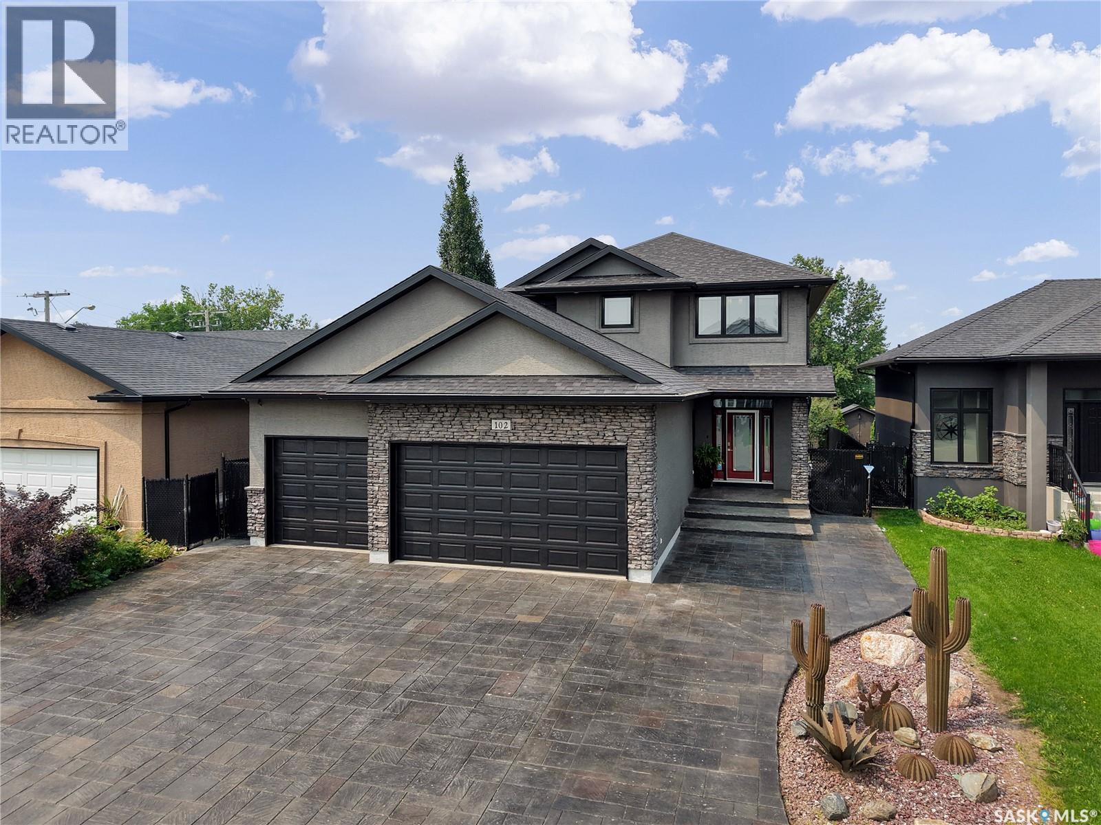 102 Kinsmen Crescent, Martensville, SK - Outdoor With Facade