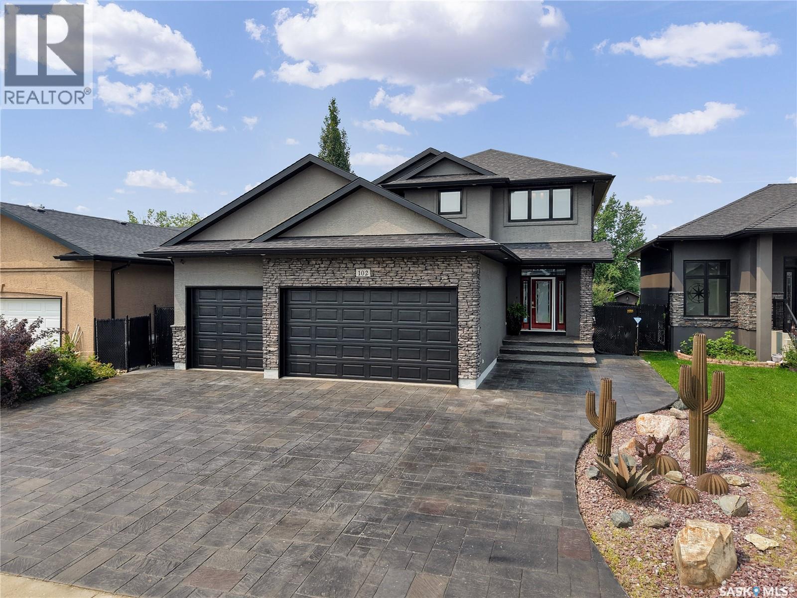 102 Kinsmen Crescent, Martensville, SK - Outdoor With Facade