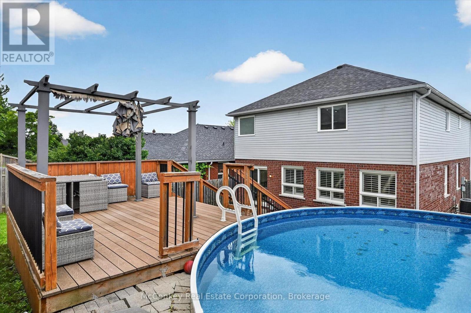609 Ackerman Crescent, Peterborough (Monaghan Ward 2), ON - Outdoor With Above Ground Pool With Deck Patio Veranda With Exterior
