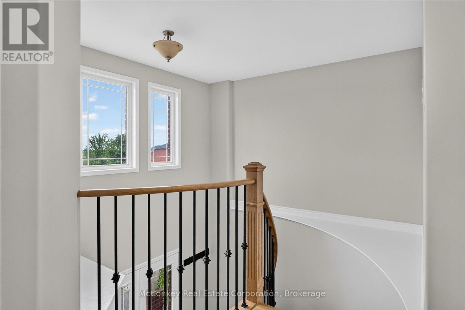 Dramatic Sweeping Staircase - 609 Ackerman Crescent, Peterborough (Monaghan Ward 2), ON - Indoor Photo Showing Other Room