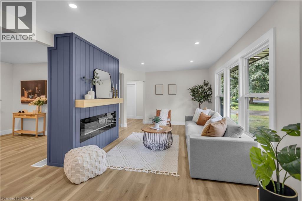 44 Tyrell Street, Simcoe, ON - Indoor Photo Showing Living Room With Fireplace