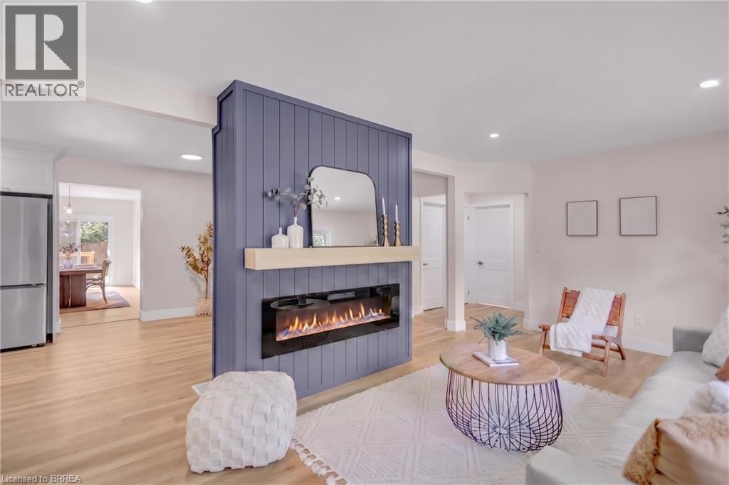 44 Tyrell Street, Simcoe, ON - Indoor Photo Showing Living Room With Fireplace