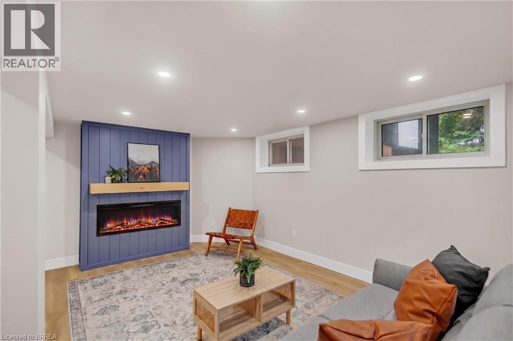 44 Tyrell Street, Simcoe, ON - Indoor Photo Showing Living Room With Fireplace