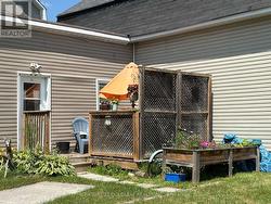 Side entrance to deck from unit #A - 