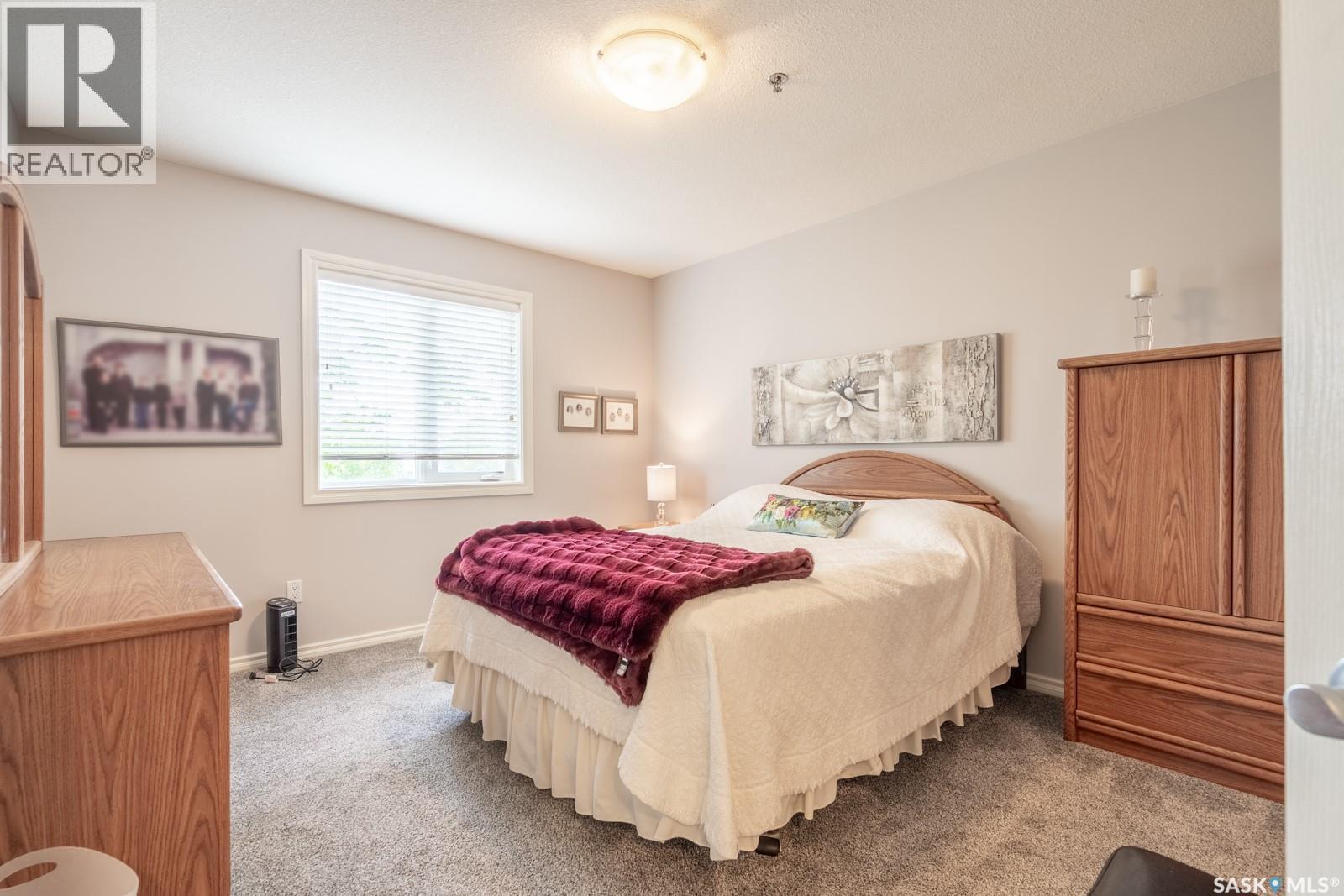 201 3101 Renfrew Crescent E, Regina, SK - Indoor Photo Showing Bedroom