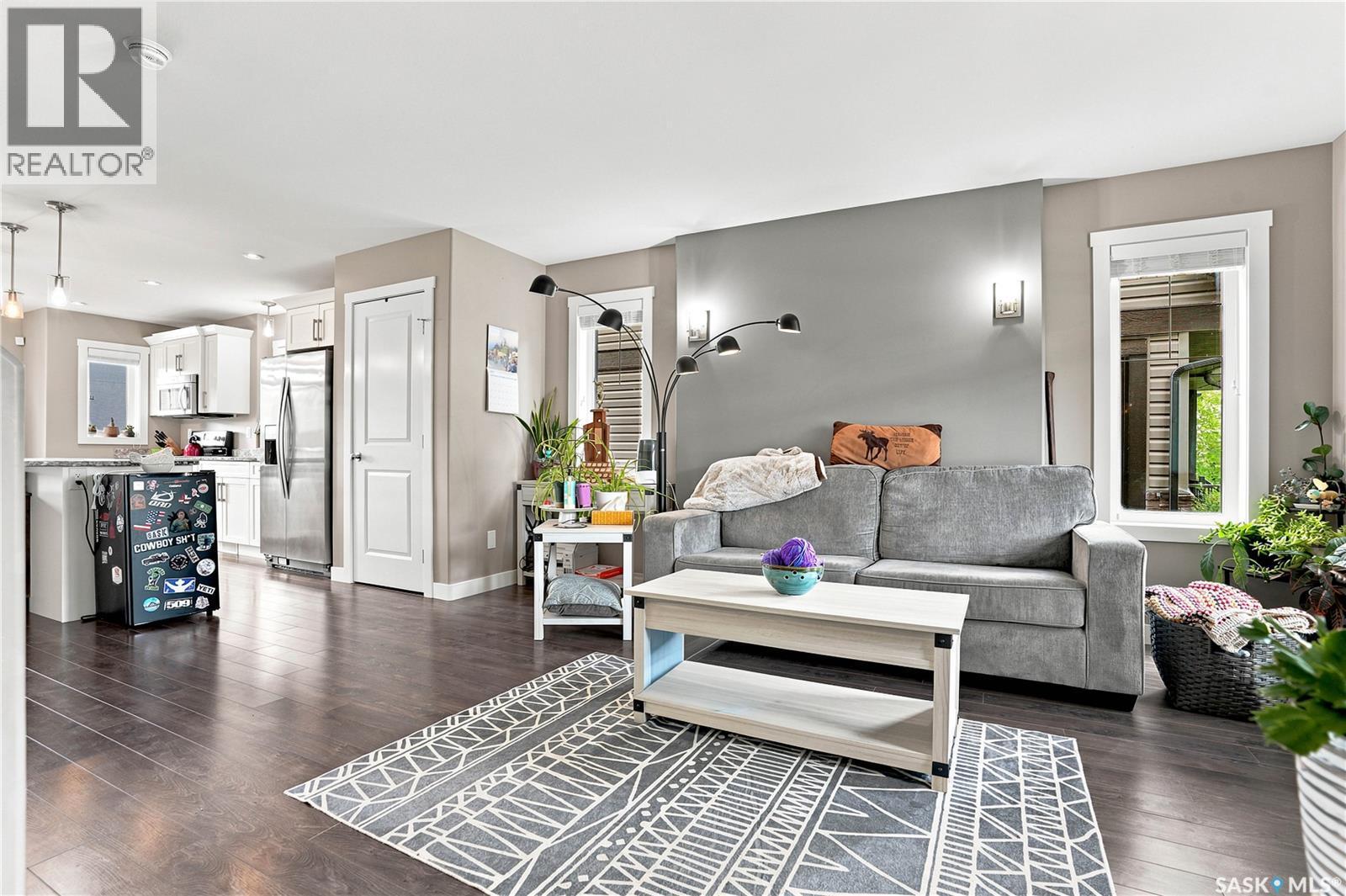 213 Rajput Way, Saskatoon, SK - Indoor Photo Showing Living Room